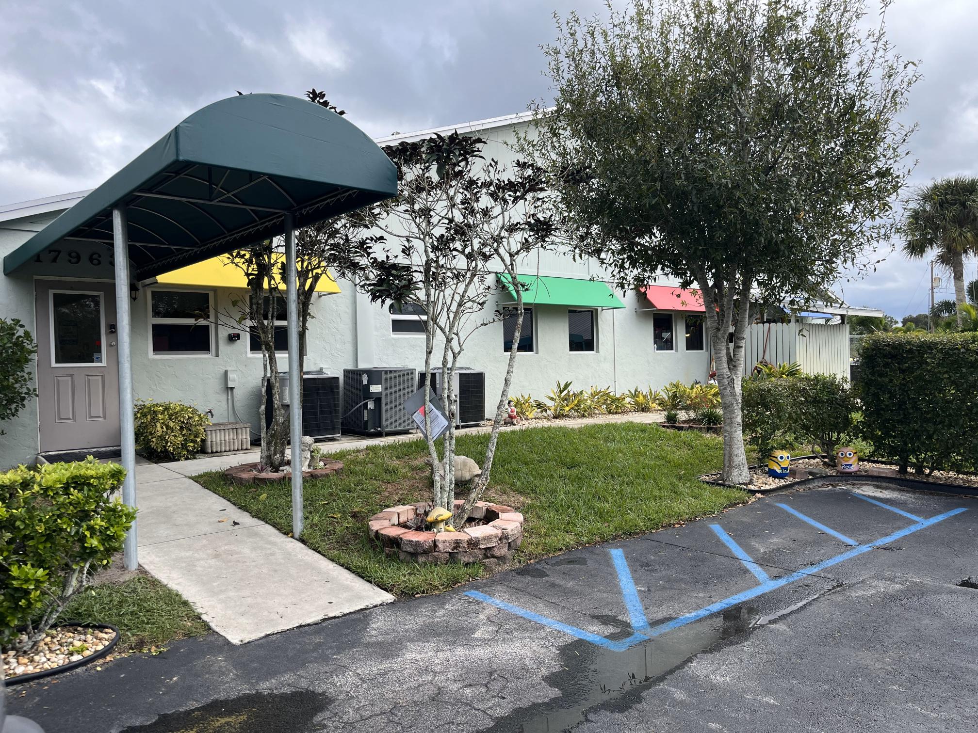 Entrance Canopy And Colorful Window Awnings At Abc Montessori In Jupiter Farms